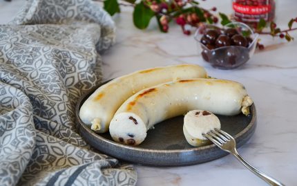 Boudin blanc aux griottes entier sur assiette